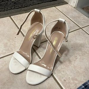 White high heels only worn once in good condition.